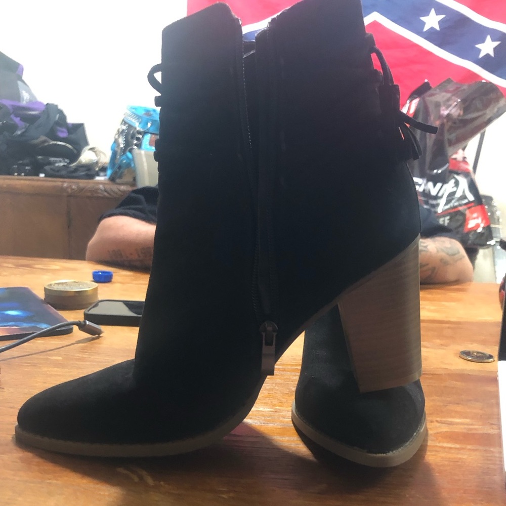 Worn a couple times. Still pretty much new